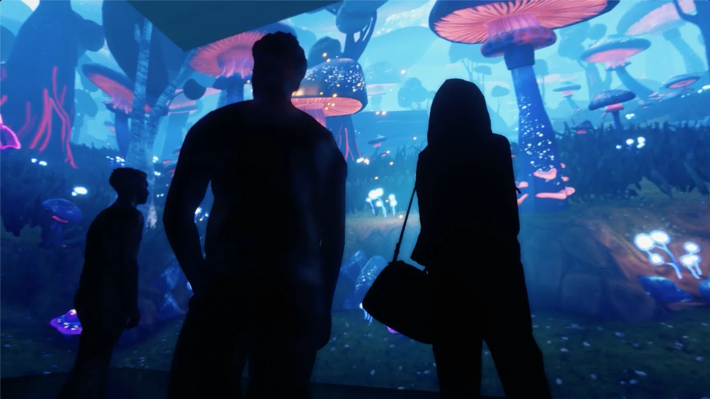 Guests surrounded by giant luminous mushrooms in Waking Wonderland